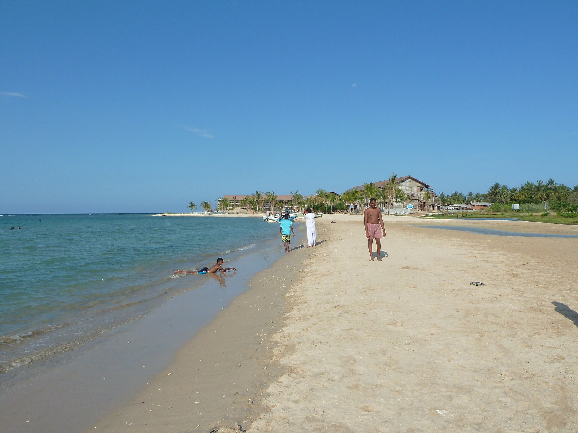 The beach and shallow coastal waters at Passikudah